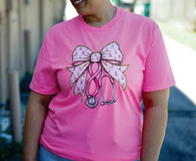 Load image into Gallery viewer, Pink Bow &amp; Stethoscope Breast Cancer Support Tee
